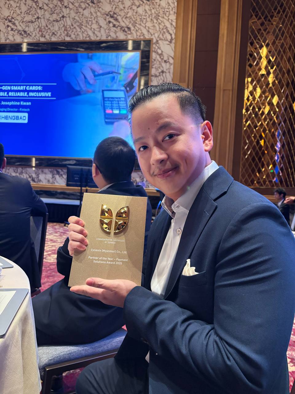 Holding an award at an industry event