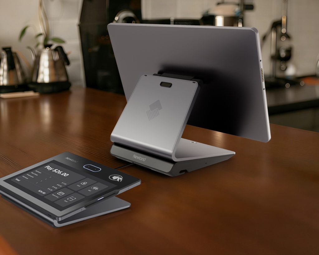 Tablet POS terminal on a stand on a café counter